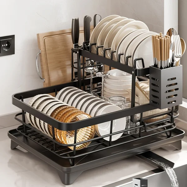 Sc82c4077e665429d992e90e3b5a9a89eH-1.webp Keep your kitchen clean, organized, and efficient with this 2‑Tier Stainless Steel Dish Drying Rack. It is built with upgraded 304 stainless steel, and therefore offers exceptional durability and resistance to rust, stains, and discoloration. As a result, you get a long‑lasting dish rack that stays sturdy even with daily use. In addition, the included plastic drainboard adds stability and prevents water from pooling on your countertop. This dish rack features an automatic drainage system designed to keep your kitchen dry and spotless. The drainboard has a slanted surface that directs water toward the center, and underneath it is a 360° rotatable, extendable drain spout. Because you can adjust the spout to match your sink’s position, excess water flows directly into the sink—never onto your counters. Furthermore, this system eliminates water stains and reduces the need for constant wiping. The 2‑tier removable design provides generous storage space while saving up to 50% of your countertop area. You can store plates, bowls, cups, utensils, and even small pans. Meanwhile, the vertical layout makes it perfect for countertops, corners, and window sills. Because of its large capacity, it’s ideal for families or anyone who wants a cleaner, more organized kitchen. Installation is quick and simple. No tools are required, and all accessories can be removed easily for cleaning. This helps prevent grease and dirt from building up in hard‑to‑reach areas. If you ever need support, our customer service team is ready to help, ensuring a smooth and worry‑free experience. Overall, this dish drying rack combines durability, convenience, and smart design to give you a cleaner and more efficient kitchen. Features