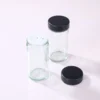 See8b315b9c1a4837816cb22ac7e3f80a5-1.webp Glass Seasoning Holder Storage Home Spice Rack 360° Rotating Spice Glass Bottle Set Includes 9 Glass Jars